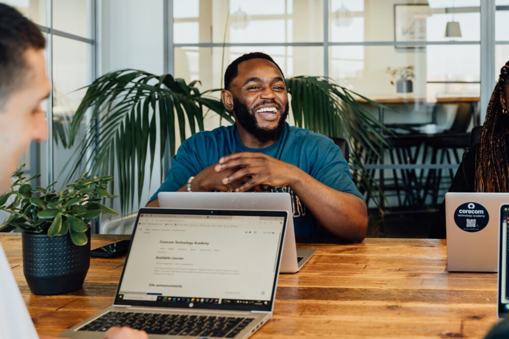 Sam smiling in the CTA office