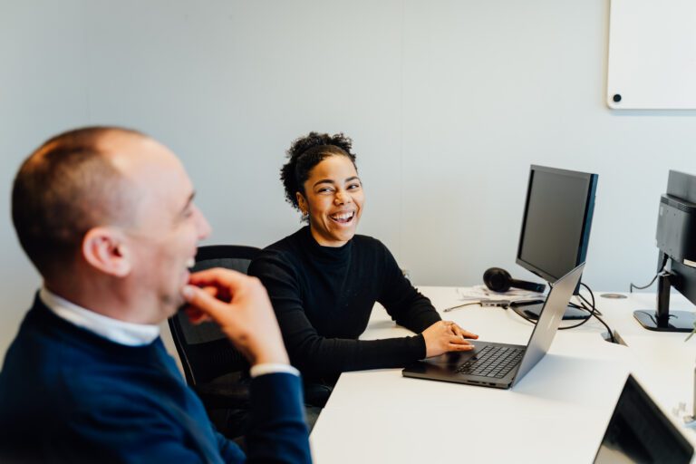 Colleagues discussing a project