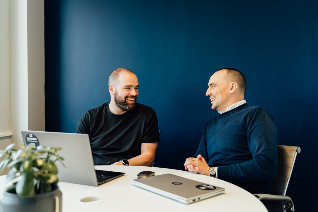 James and Thomas working together and laughing